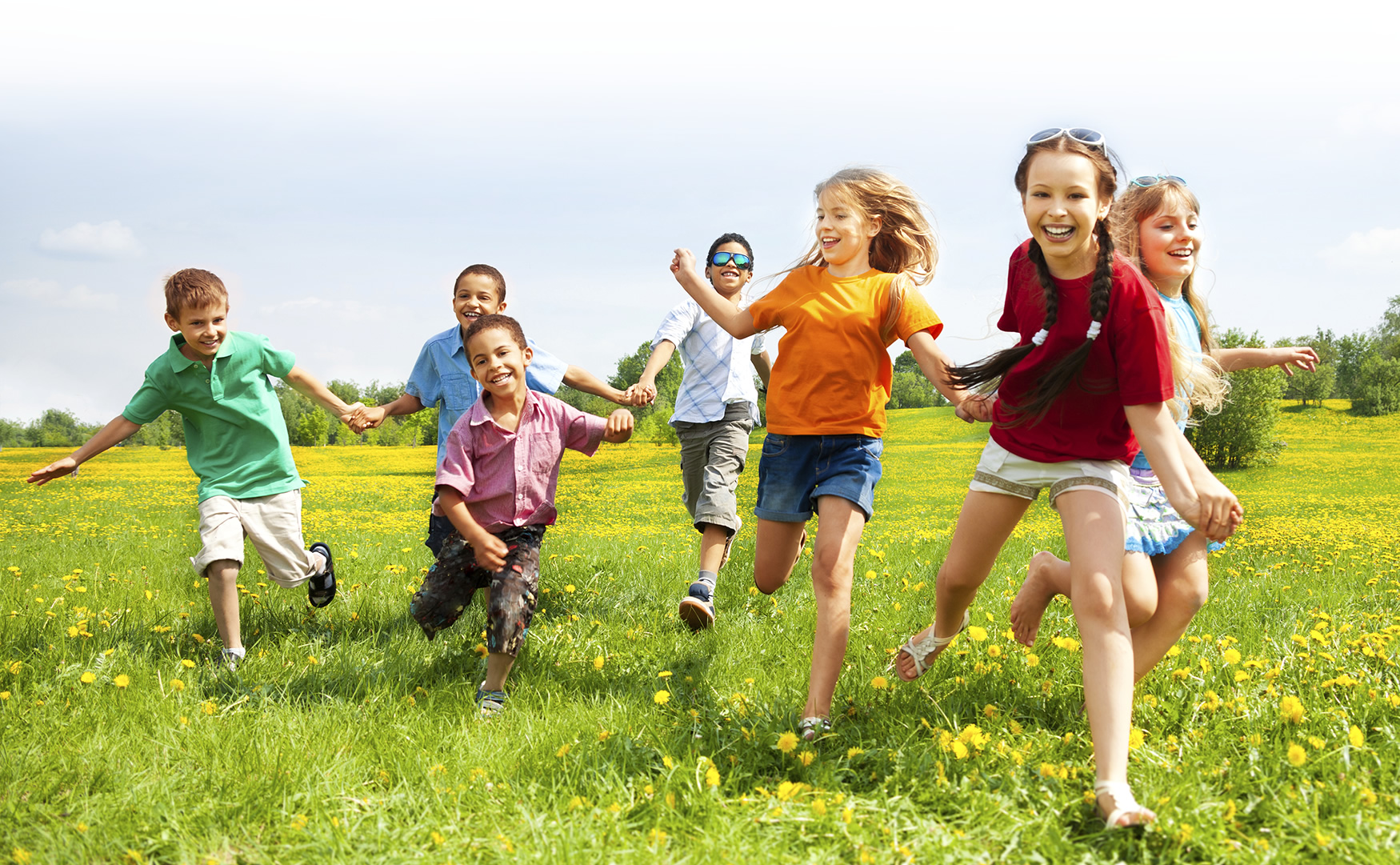 kids running in a field
