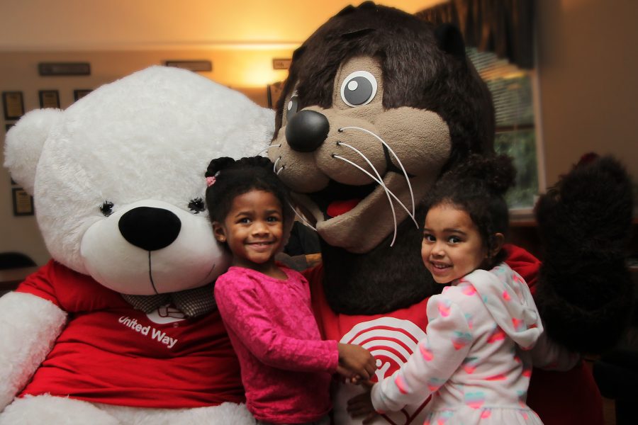 kids giving Seymour a hug