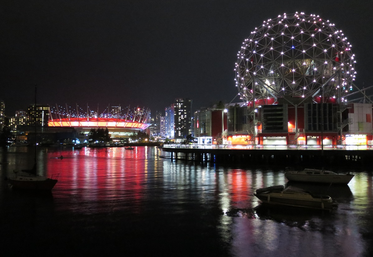 A photo of false creek at night.