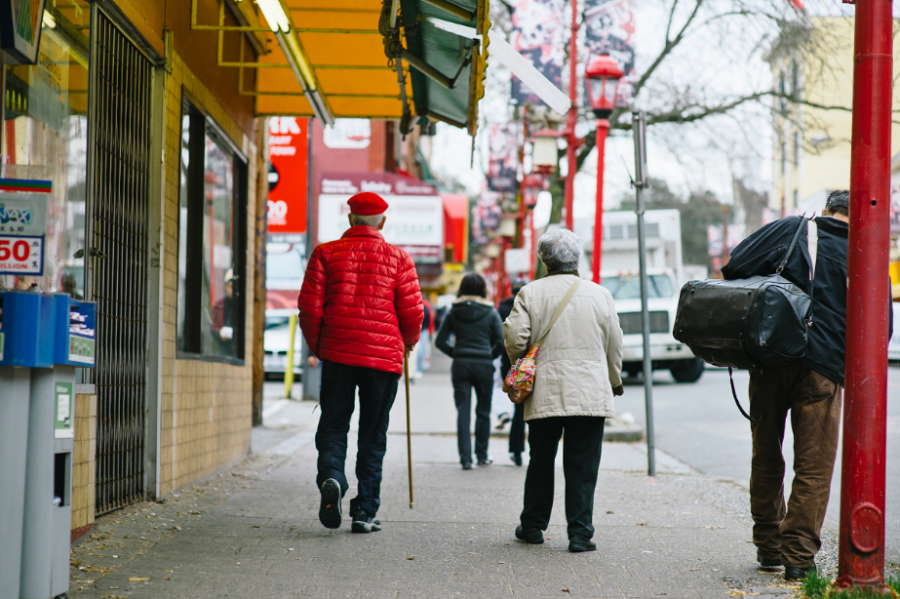 seniors walking down a street