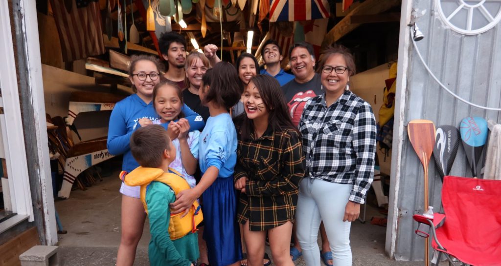 Indigenous kids and their canoe coach in North Vancouver