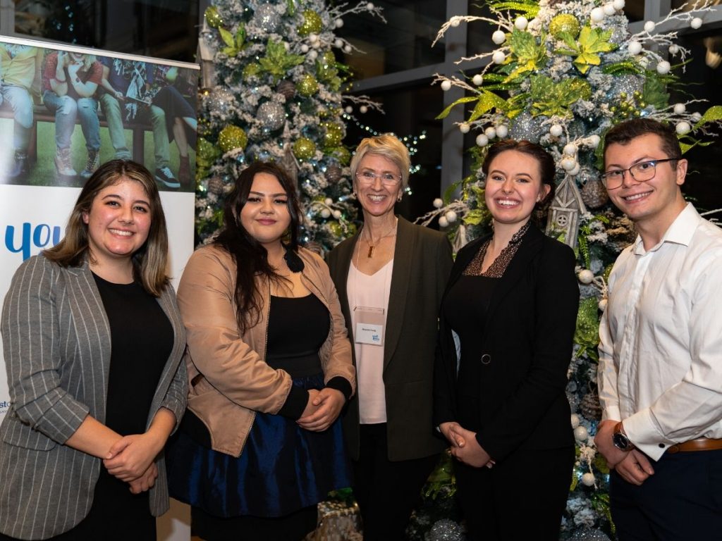students with maureen young at yfef event