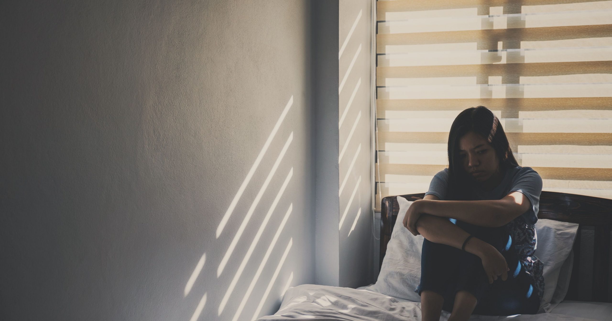 girl alone in room